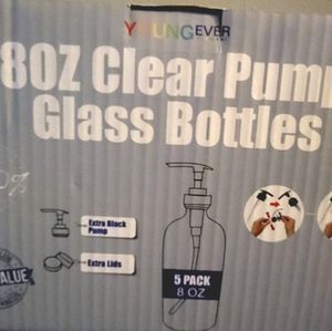 Set of Glass jars/Bottles with pump lids. Brand new never opened.